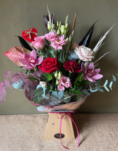 Poppy's Flower Design Florist in Leyland - Amour - A mixture of desirable deep reds, pastel pinks, with mixed luscious foliage and a dash of boho.
Flowers in Leyland Florist in Leyland Poppy's Flower Design