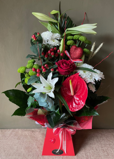 Poppy's Flower Design Florist in Leyland - Romance - Beautiful bouquet in red and white including lilies, a red rose and a tropical anthurium.
Flowers in Leyland Florist in Leyland Poppys Flower Design Poppy's